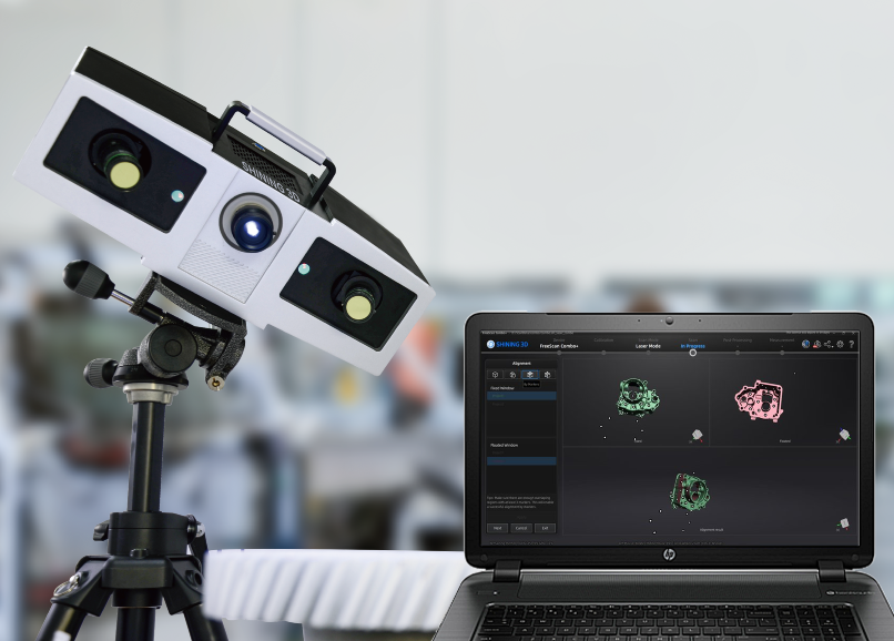OptimScan 5M Plus on a tripod beside a laptop running the scan software