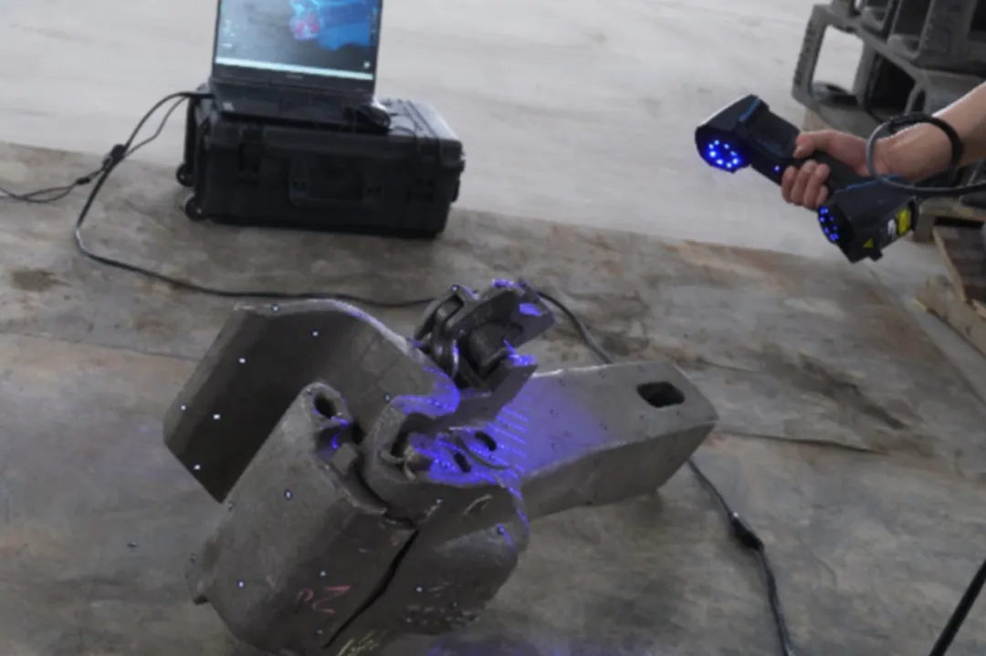 FreeScan UE Pro used for dimensional inspection of railway coupler casting component in manufacturing workshop